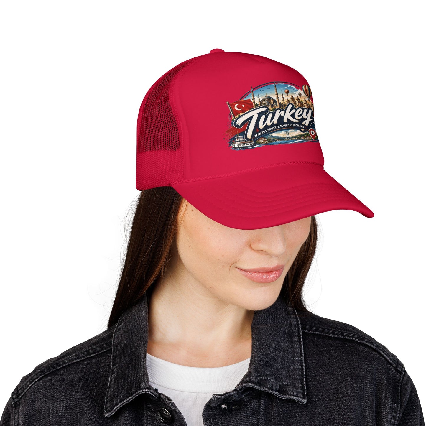 Red trucker hat with mesh back and Turkey logo patch on woman, front view
