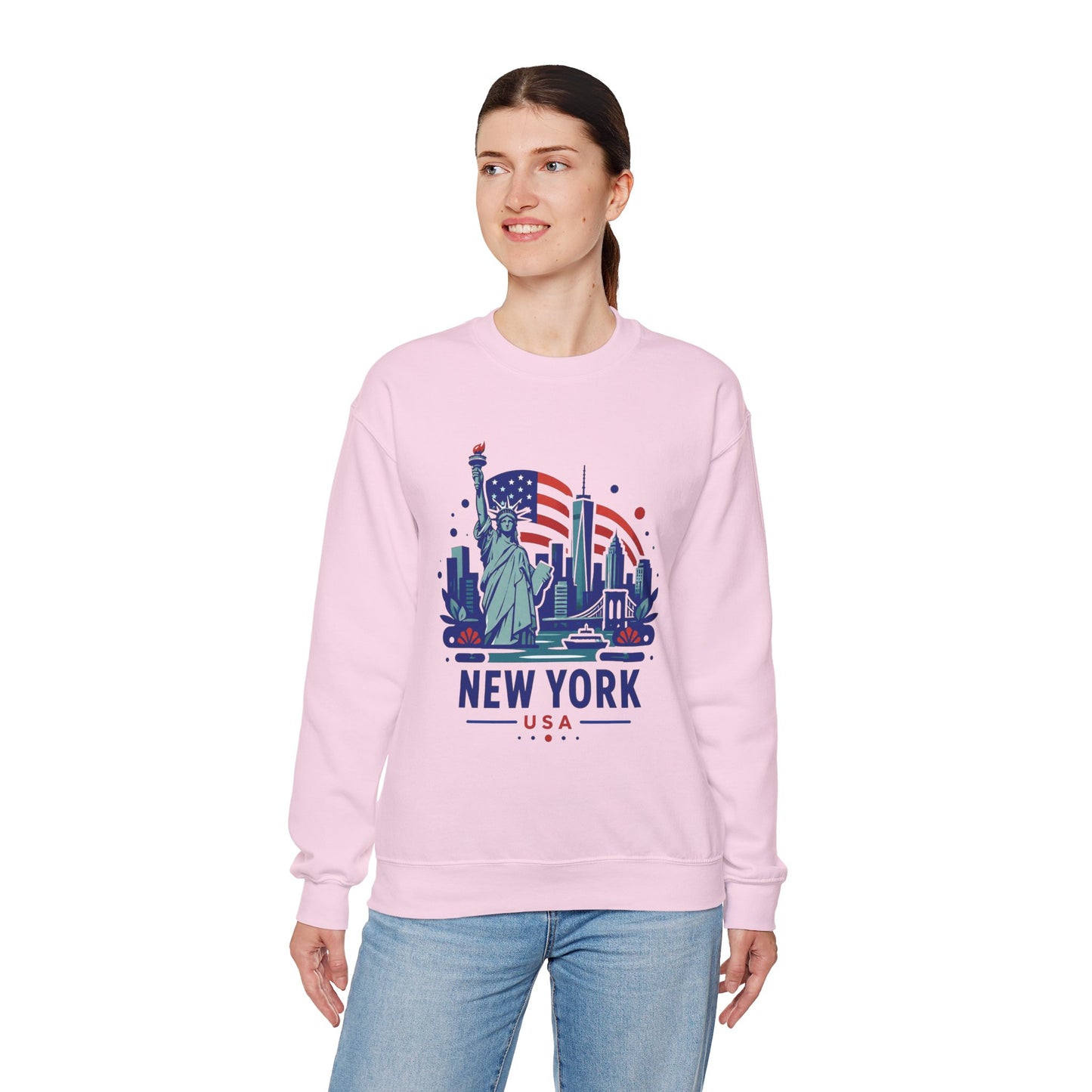 Pink crewneck sweatshirt with New York USA front graphic, worn by a woman