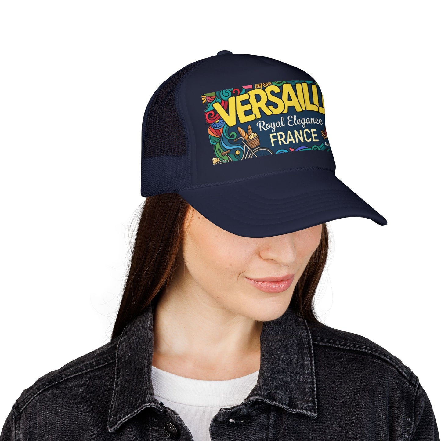 Navy trucker hat with mesh side panels and colorful “Versailles France” front patch