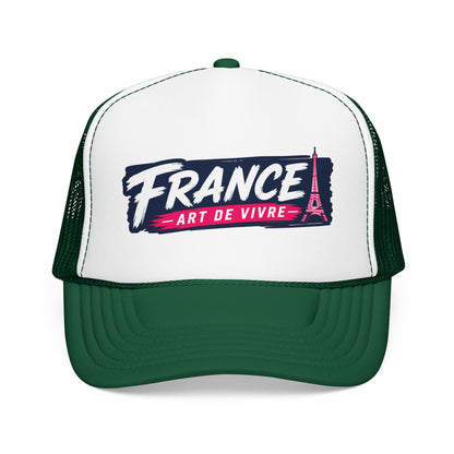 Green and white trucker hat with mesh sides and “FRANCE Art de Vivre” front print