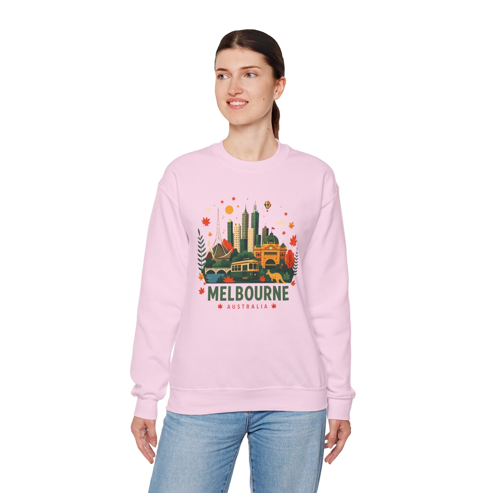 Light pink sweatshirt with Melbourne city graphic on front