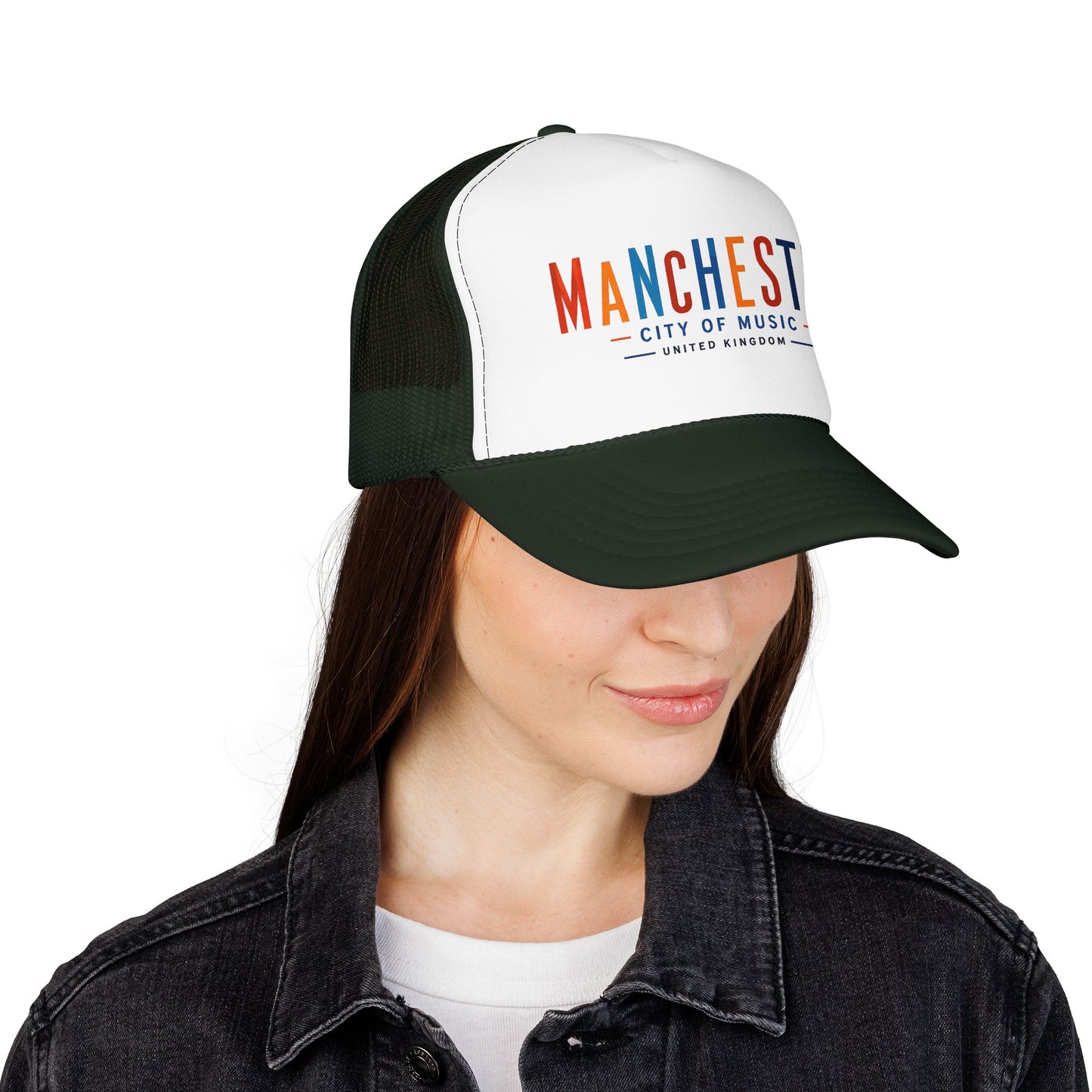 Manchester City trucker hat on model, white front logo, dark green mesh, curved brim