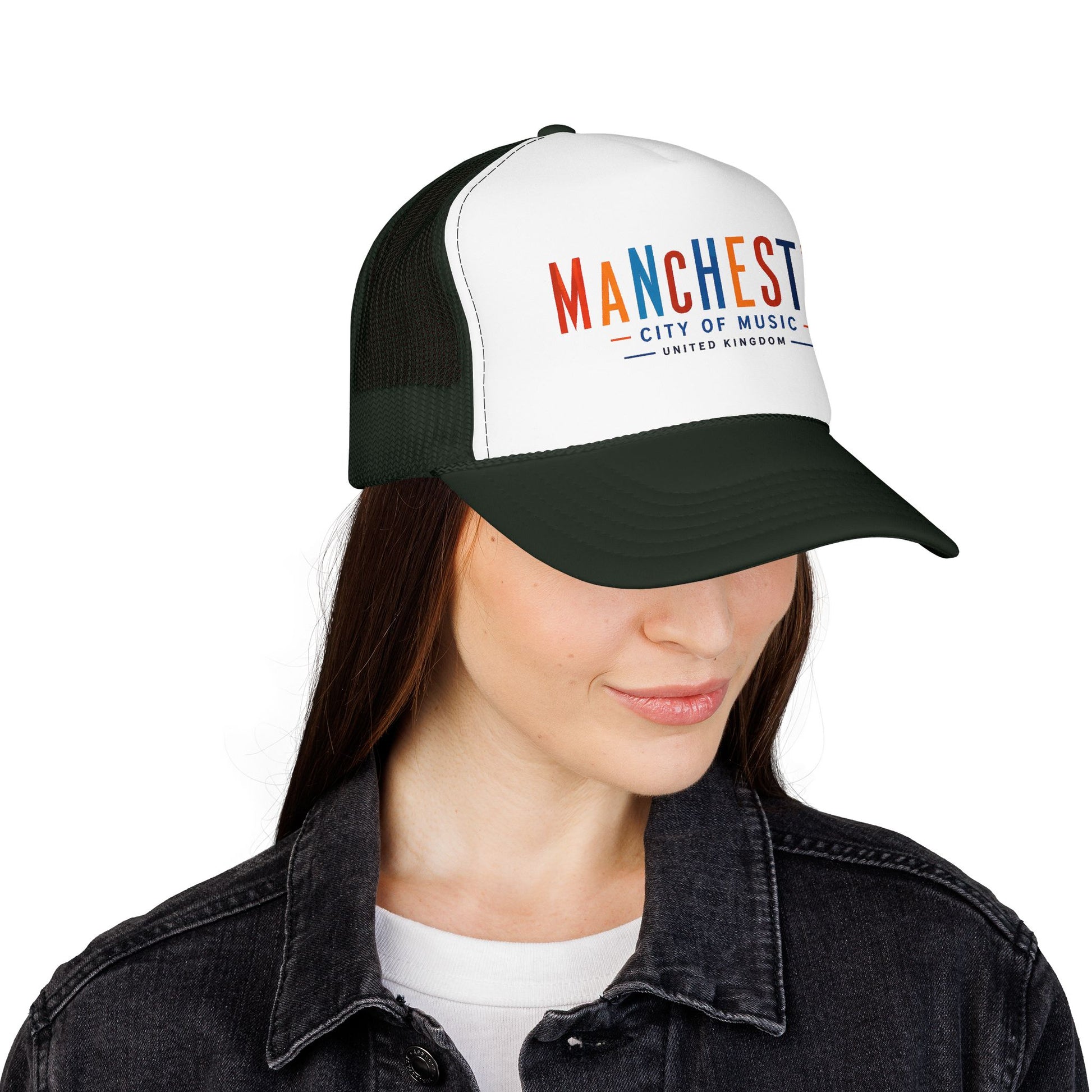 Manchester City trucker hat on model, white front logo, dark green mesh, curved brim