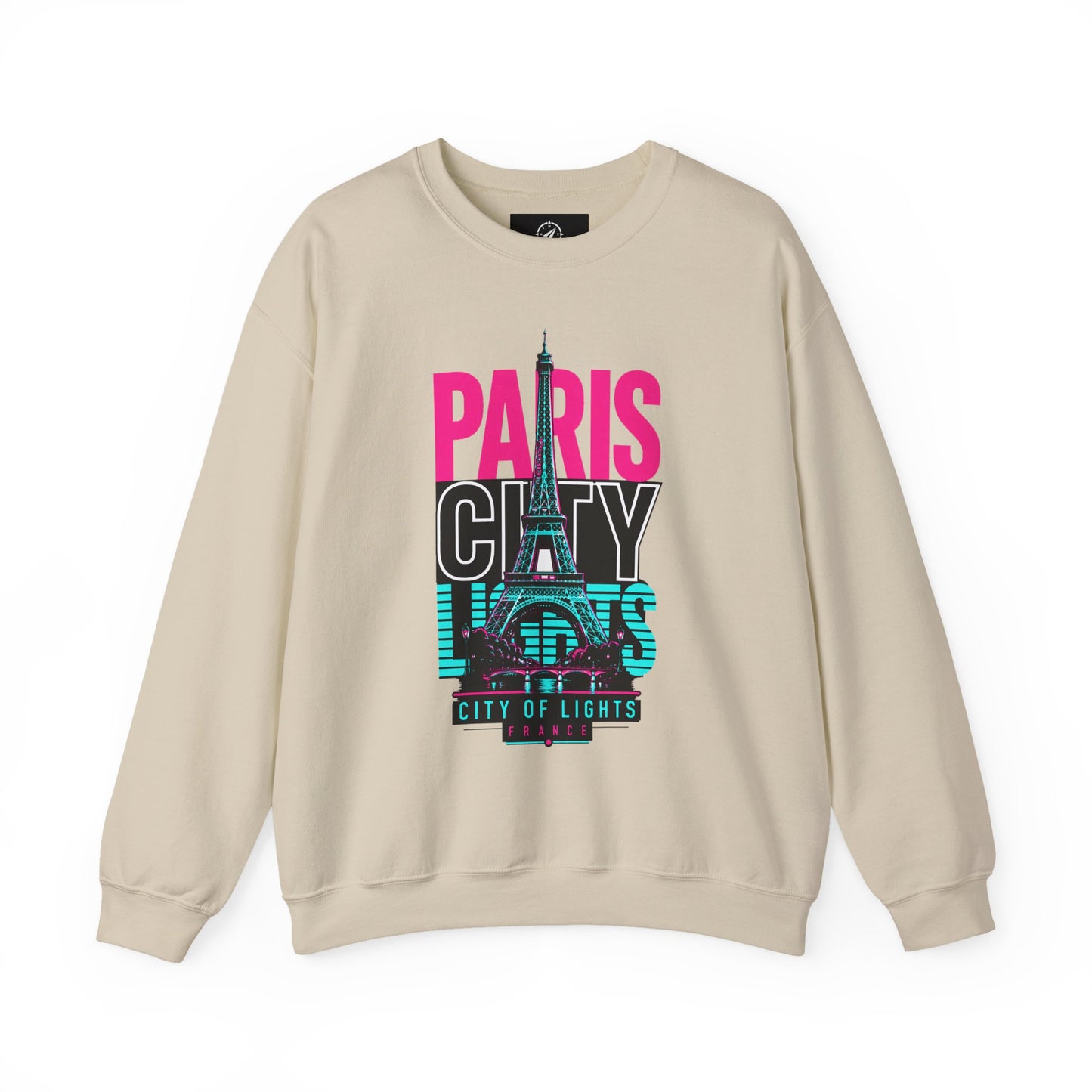 Cream crewneck sweatshirt with PARIS CITY Eiffel Tower lights graphic in pink, teal, and white.