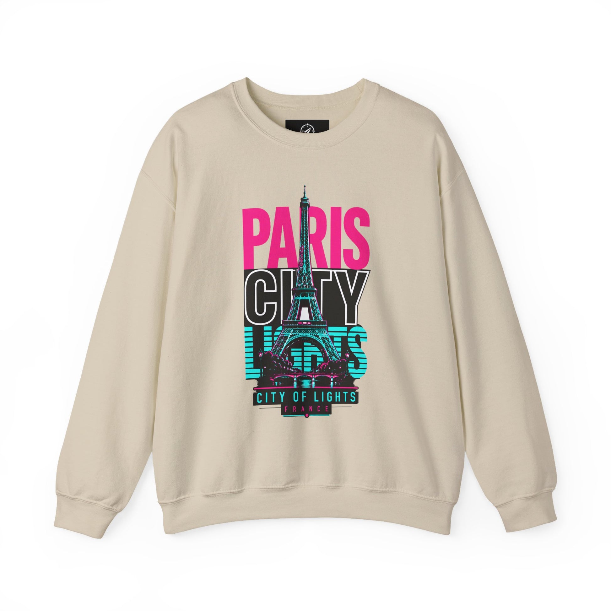 Cream crewneck sweatshirt with PARIS CITY Eiffel Tower lights graphic in pink, teal, and white.