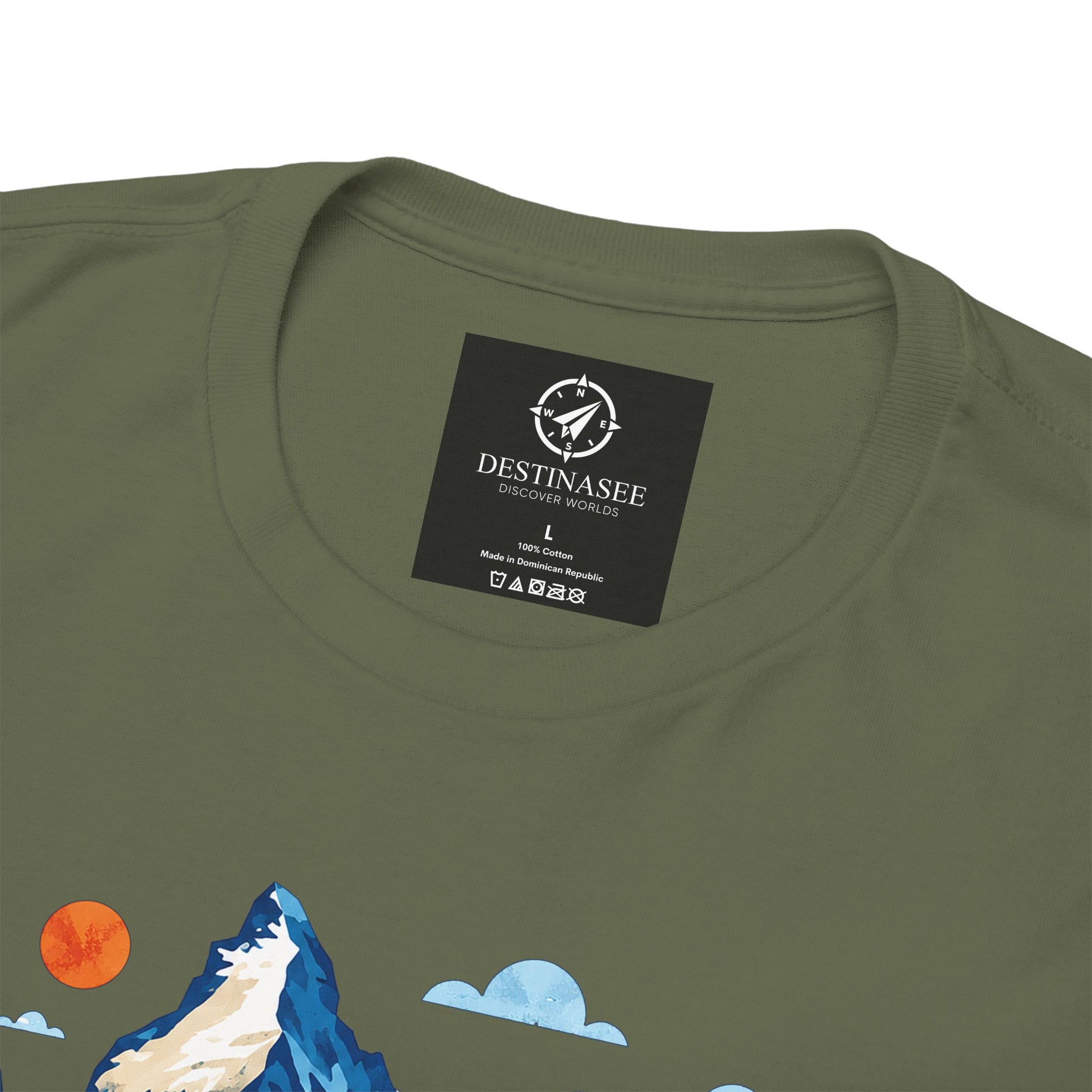 Dark green T-shirt back neck label and partial Switzerland village artwork