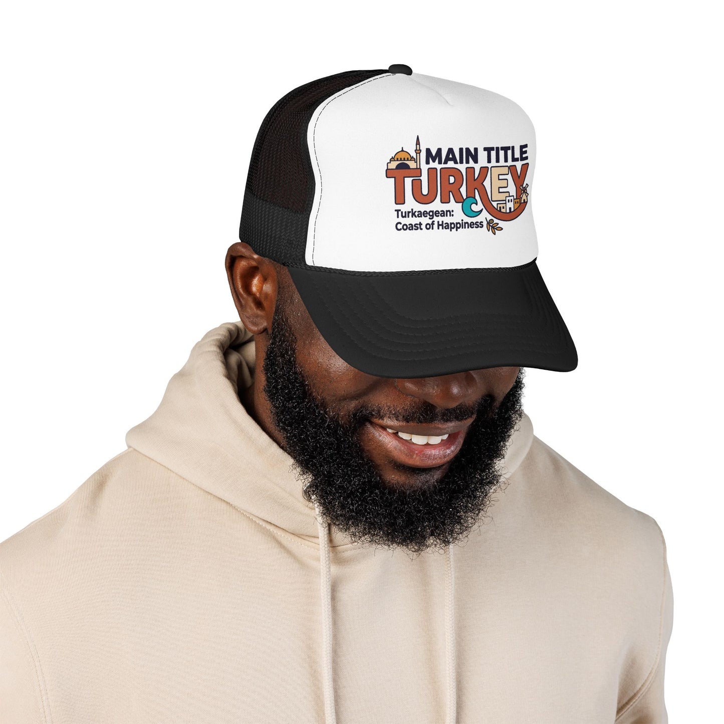 Black and white trucker hat on a man, side view with mesh back and logo patch.