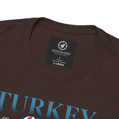 Dark brown T-shirt with Destinasee label and partial blue Turkey graphic