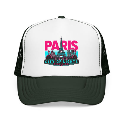 White trucker hat with black mesh sides and Paris City of Lights graphic, dark green brim.