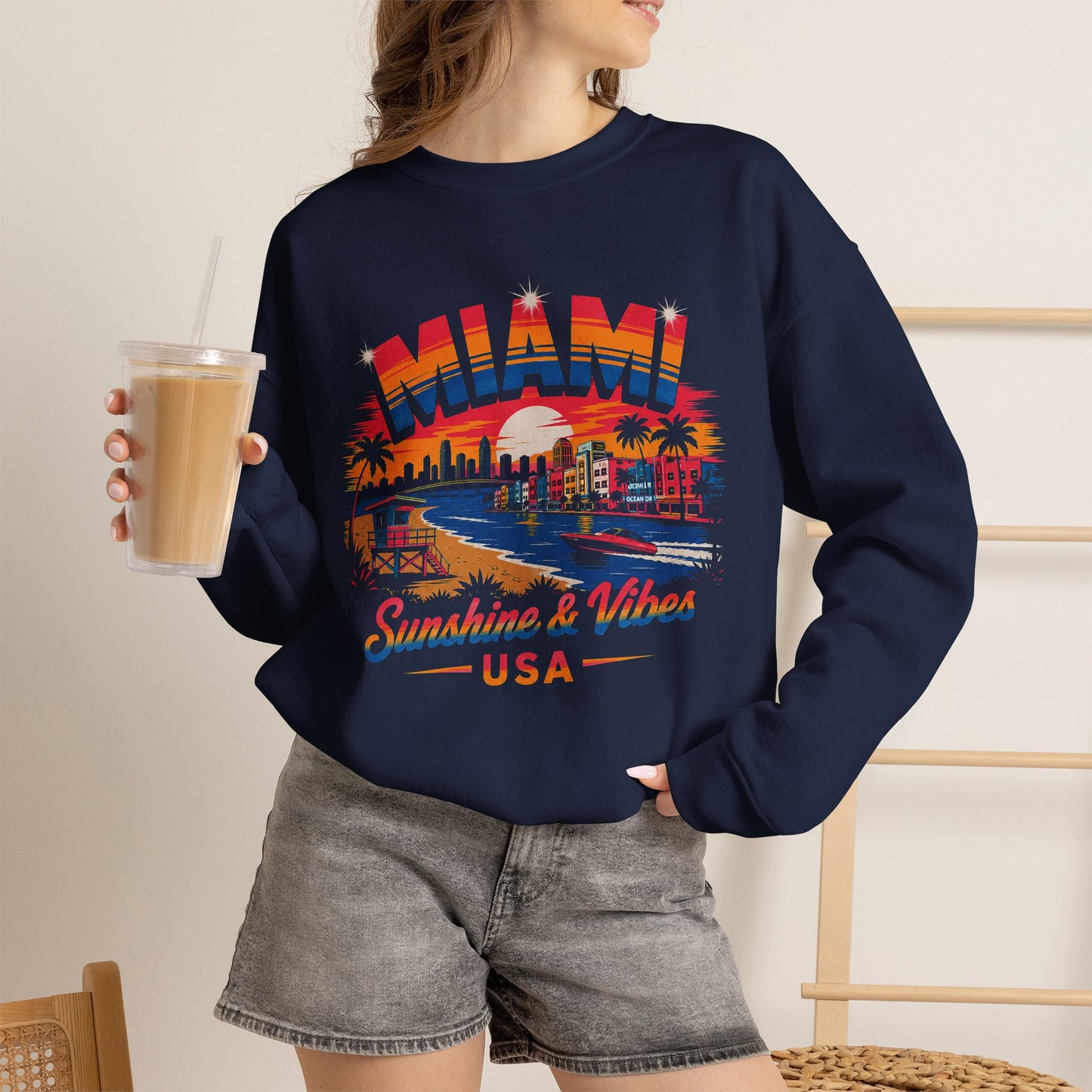 Navy crewneck sweatshirt with Miami skyline graphic and Sunshine & Vibes USA print
