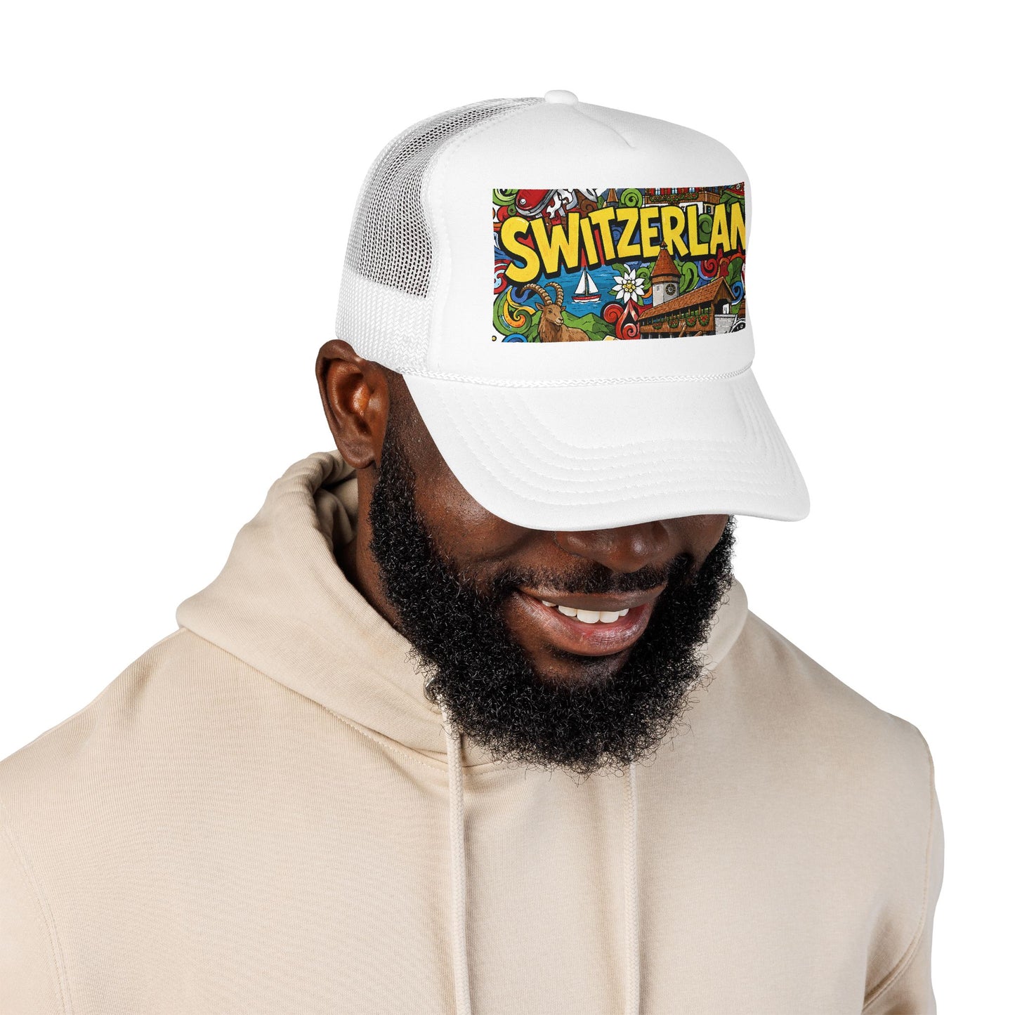 White mesh trucker hat on model, featuring colorful “SWITZERLAN” front graphic patch