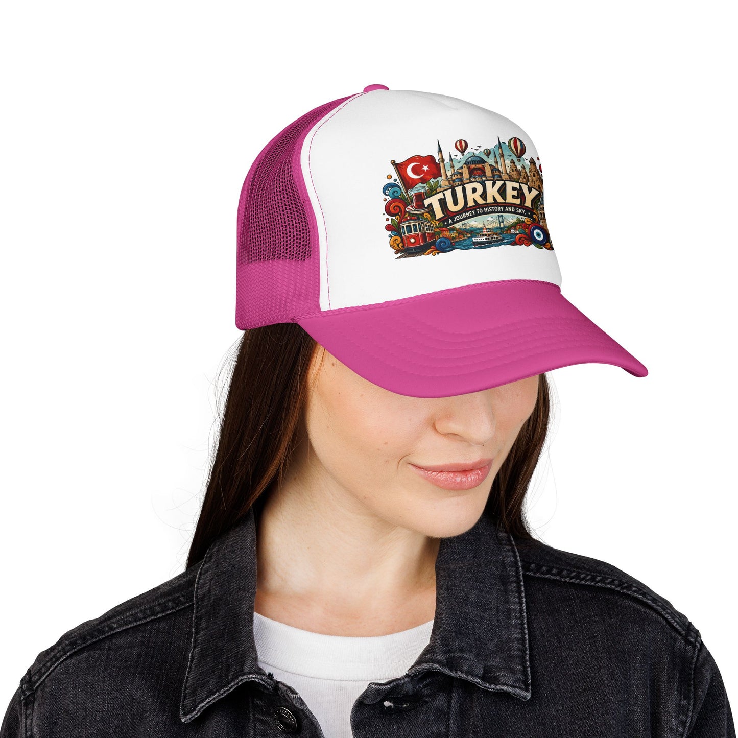 Pink and white trucker hat with magenta brim on woman, front patch visible