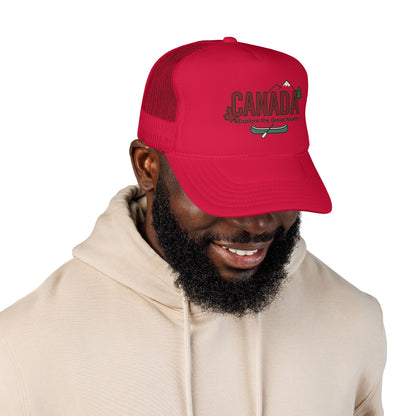 Red and dark logo foam trucker hat with Canada text on the front and curved red visor.