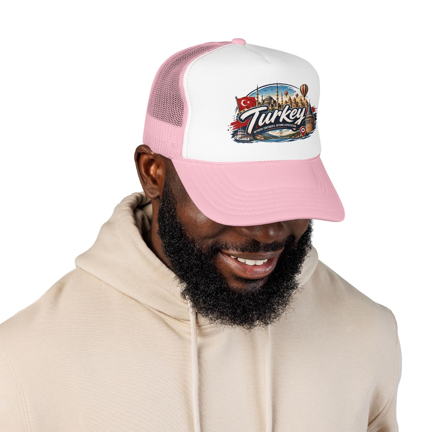 Pink and white trucker hat with mesh back, curved brim, and front Turkey graphic