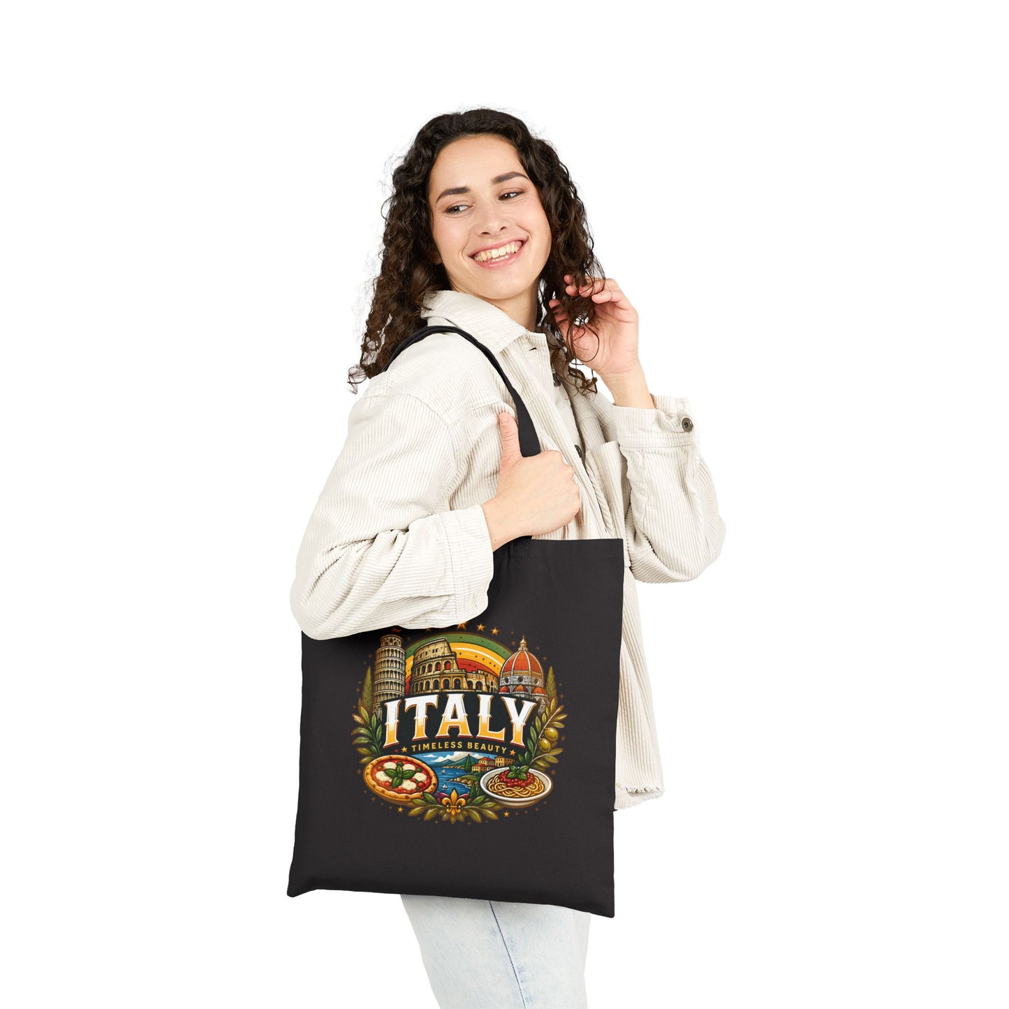 Black travel tote bag with “Italy” graphic, carried by a smiling person