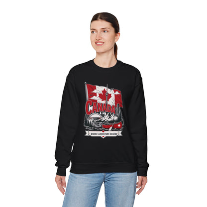 Black crewneck sweatshirt on model with Canada flag canoe graphic and long sleeves.