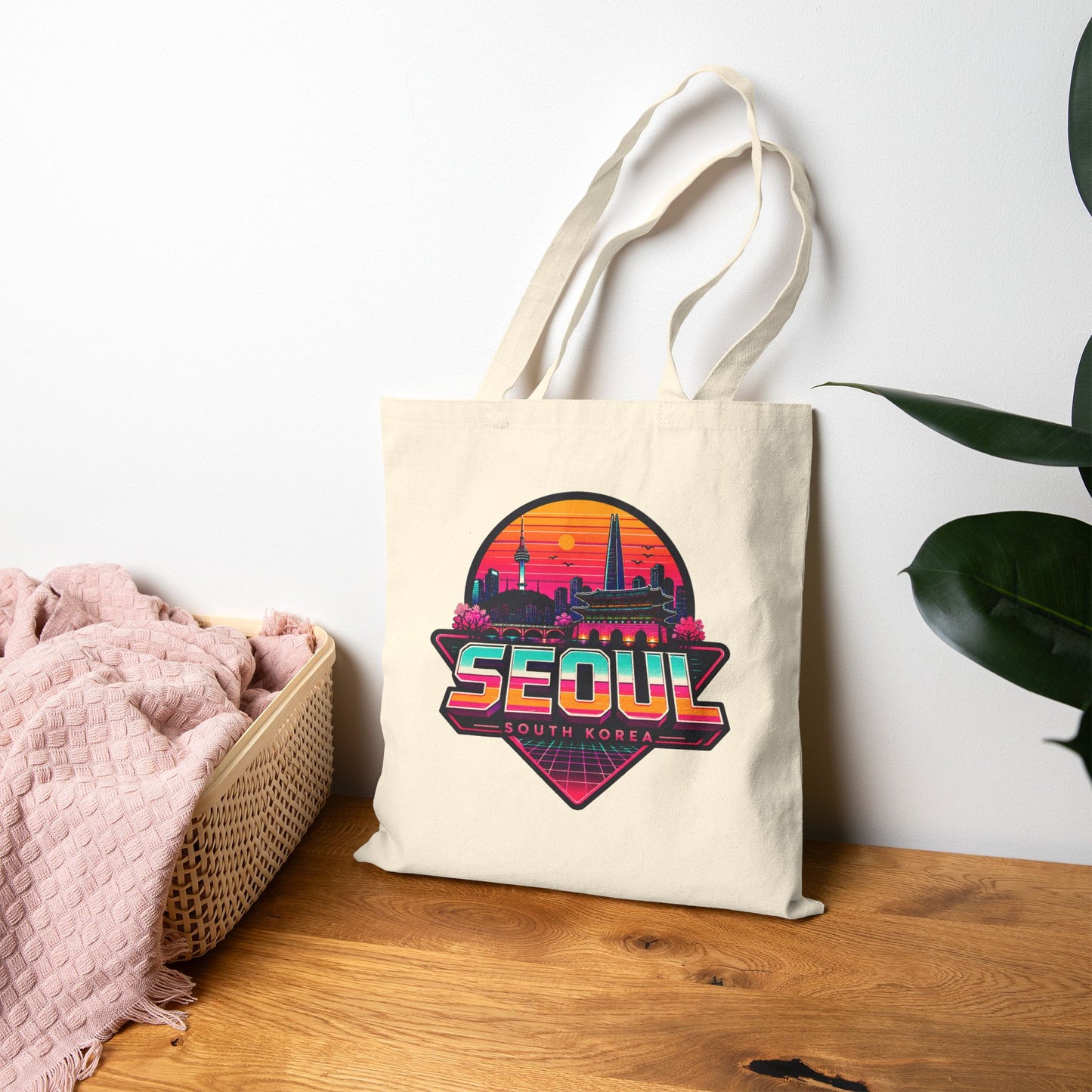Natural canvas tote bag with Seoul skyline logo, flat lay with long handles