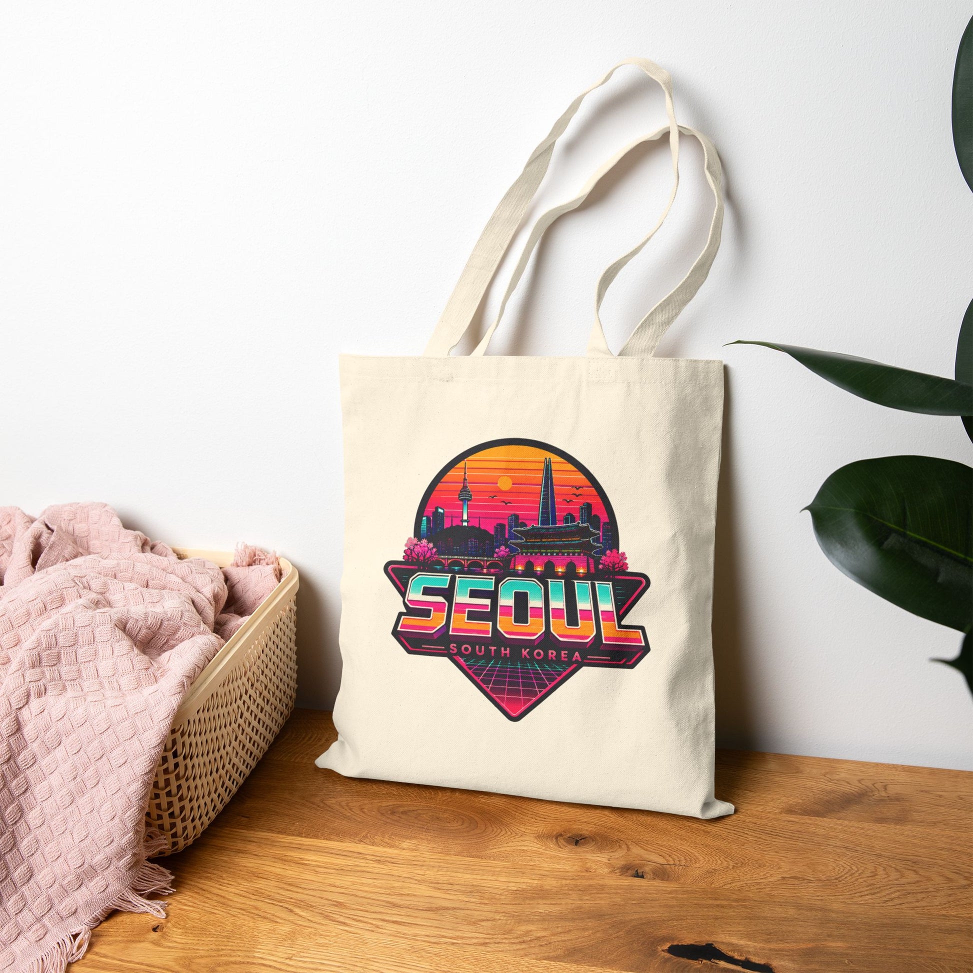 Natural canvas tote bag with Seoul skyline logo, flat lay with long handles