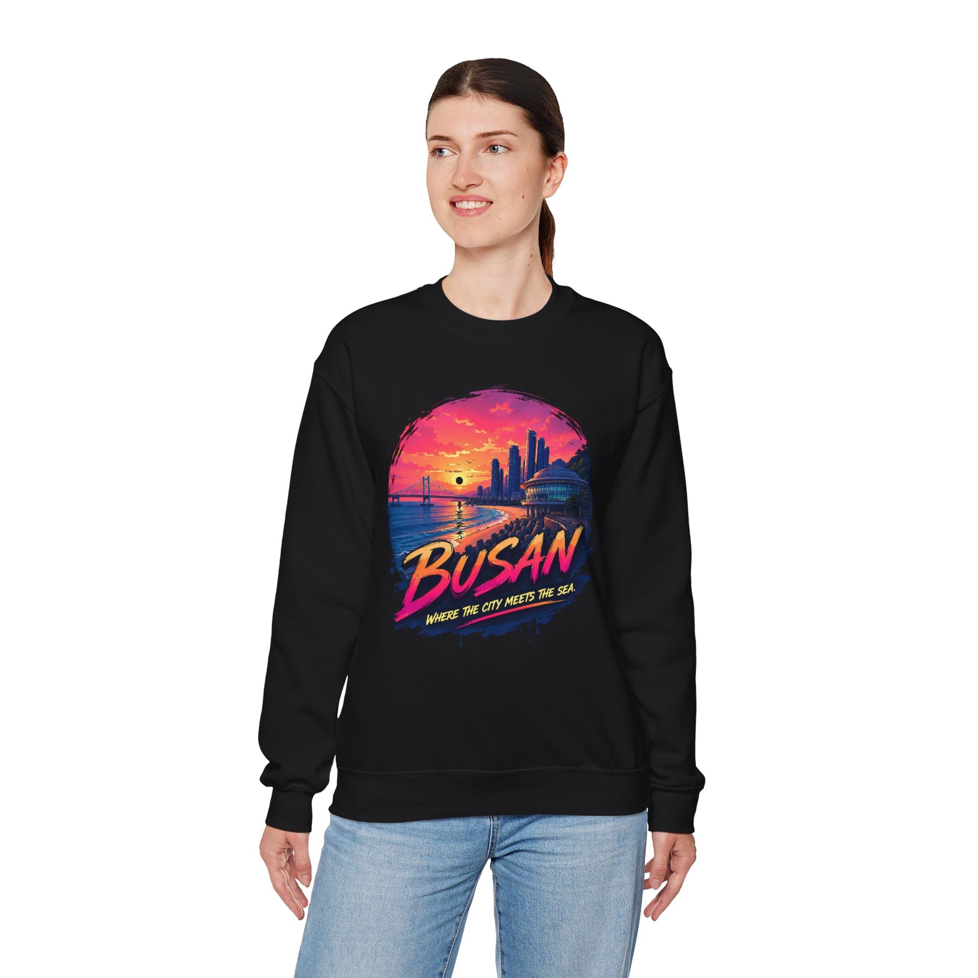 Black crewneck sweatshirt, front graphic of Busan sunset over sea and skyline