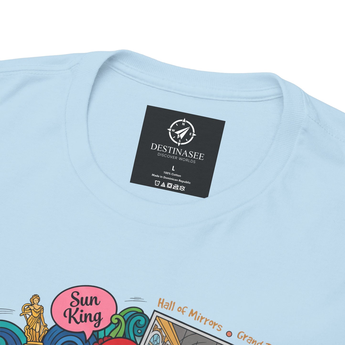 Light blue T-shirt back close-up with black Destinassee logo compass graphic