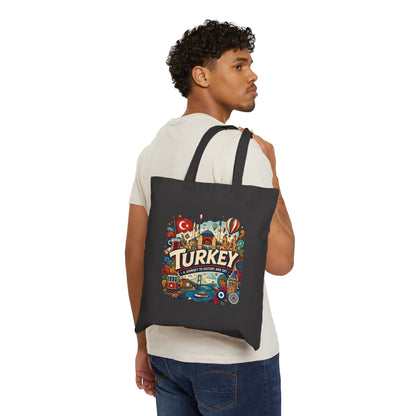 Black canvas tote bag with colorful Turkey travel graphic, worn on shoulder