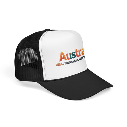 Black-and-white trucker cap with orange Australia logo, front angled view