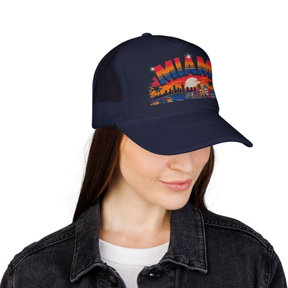 Dark navy trucker hat on model, Miami sunset skyline front graphic visible