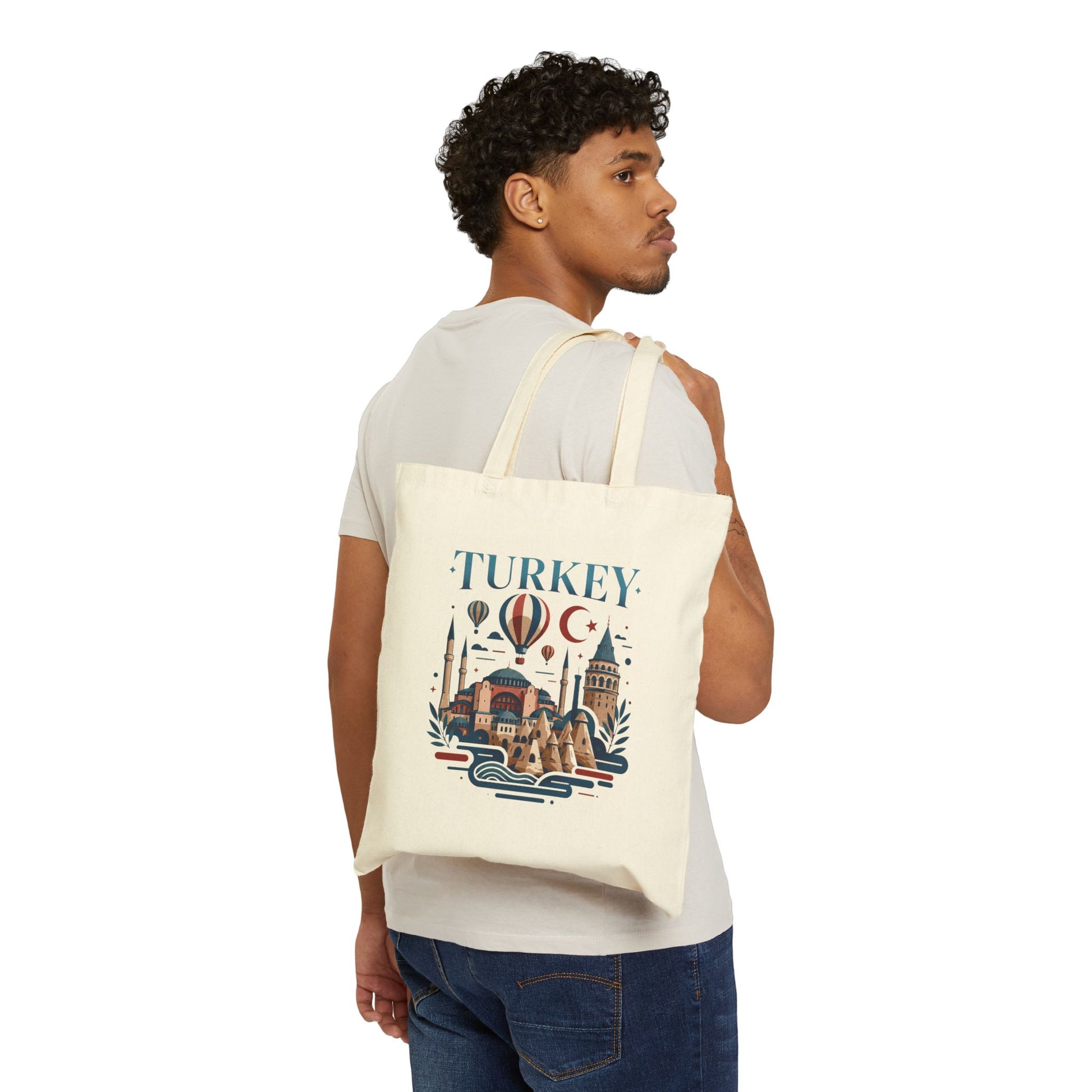 Natural canvas tote bag with Turkey graphic print, worn over the shoulder
