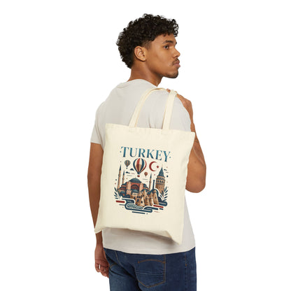 Natural canvas tote bag with Turkey graphic print, worn over the shoulder