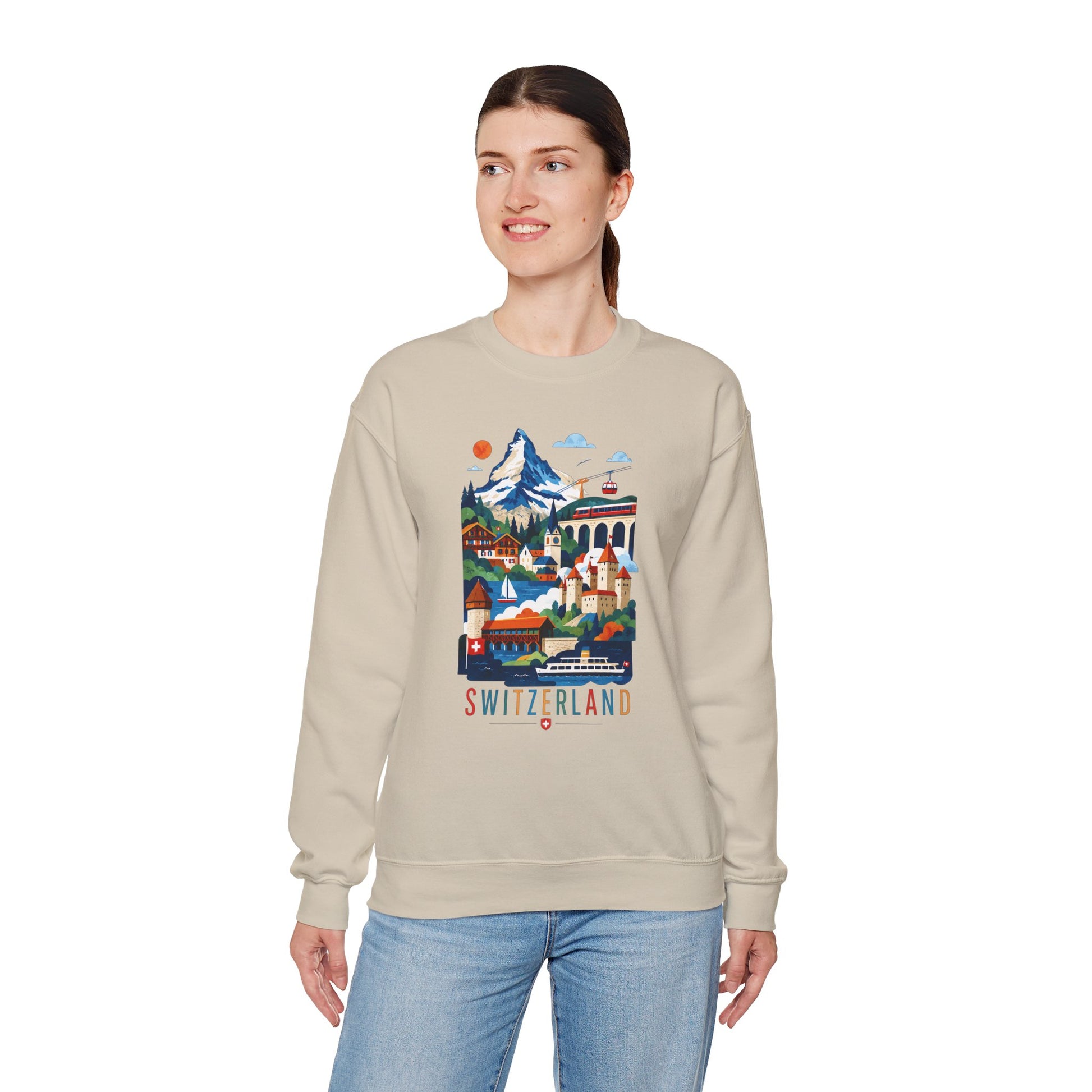 Beige crewneck sweatshirt with colorful Switzerland landscape graphic on front.