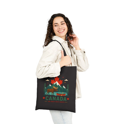 Black canvas tote bag with Canada moose graphic, front view