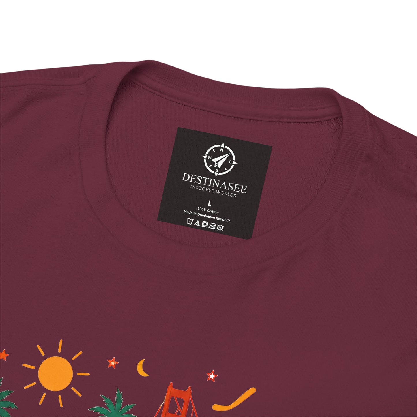 Maroon T-shirt with small neck label tag and partial colorful chest graphic