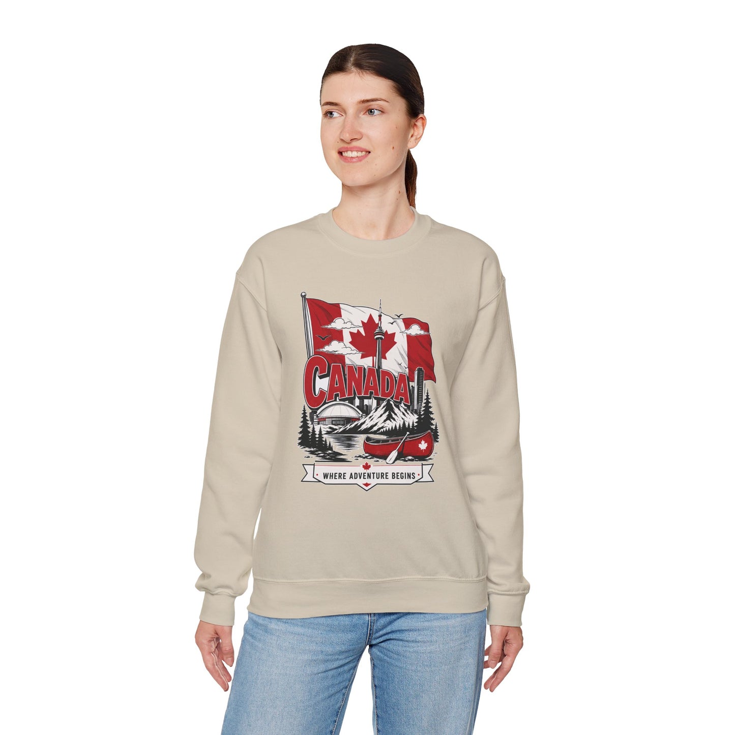 Light sand crewneck sweatshirt with Canada flag and canoe graphic on the chest.