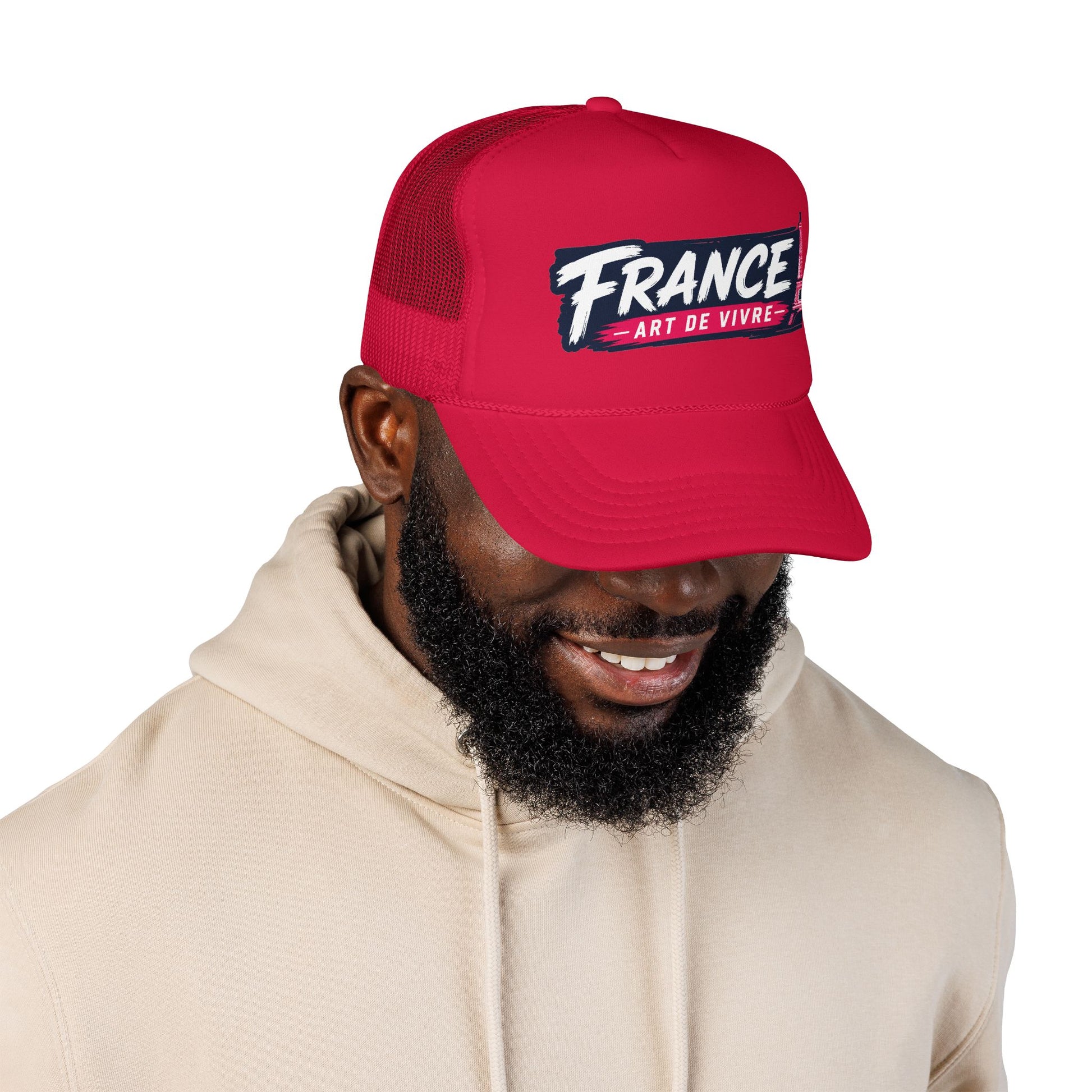 Red trucker hat with mesh back and 'FRANCE Art de Vivre' patch, worn