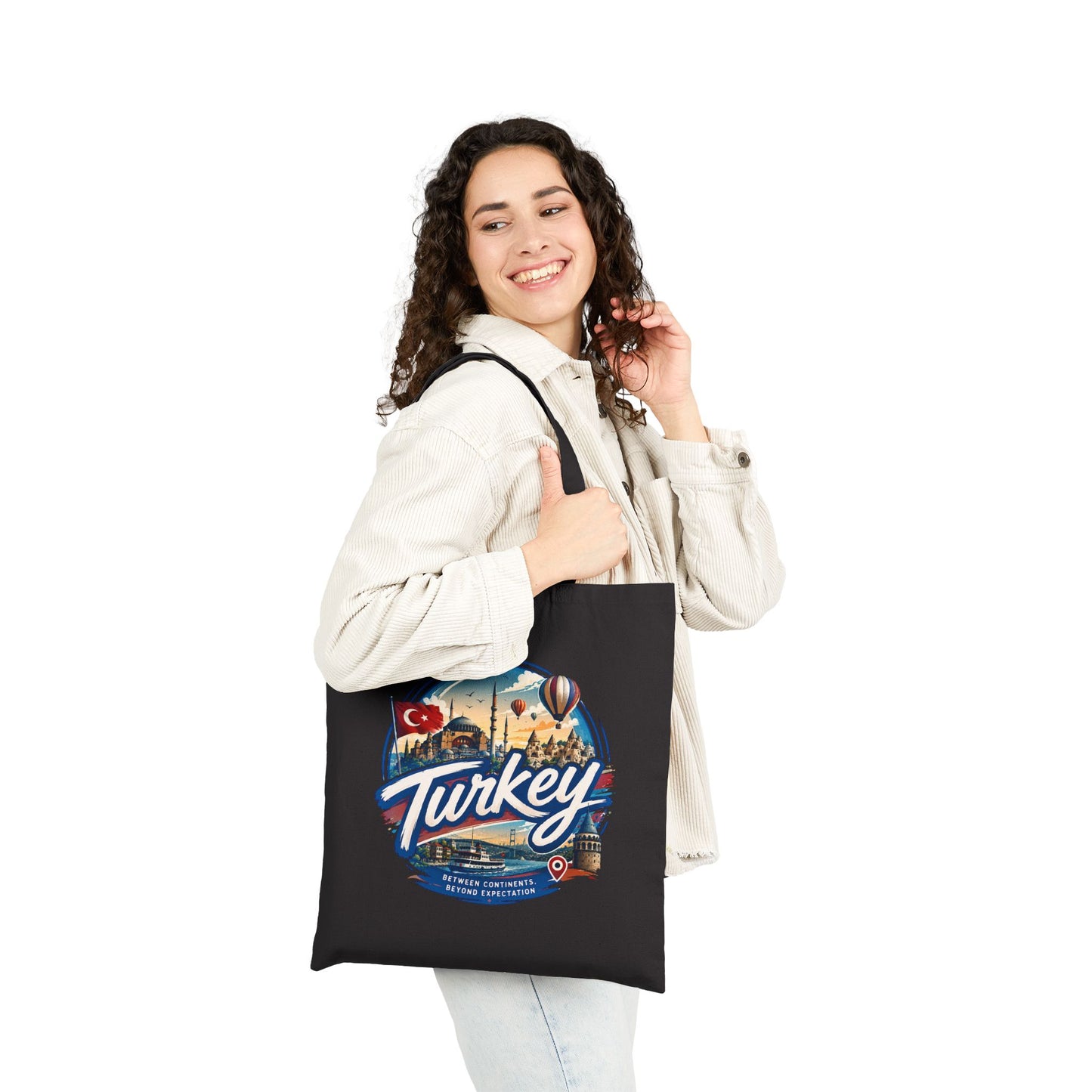 Black tote bag with long handles and Turkey scenic graphic on front