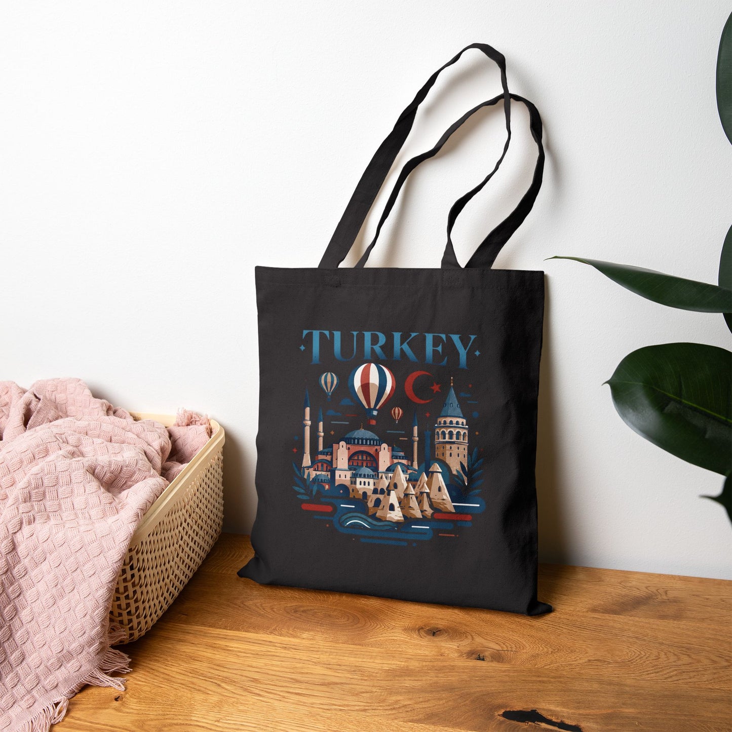 Black tote bag with "TURKEY" landmark artwork and fabric carry handles