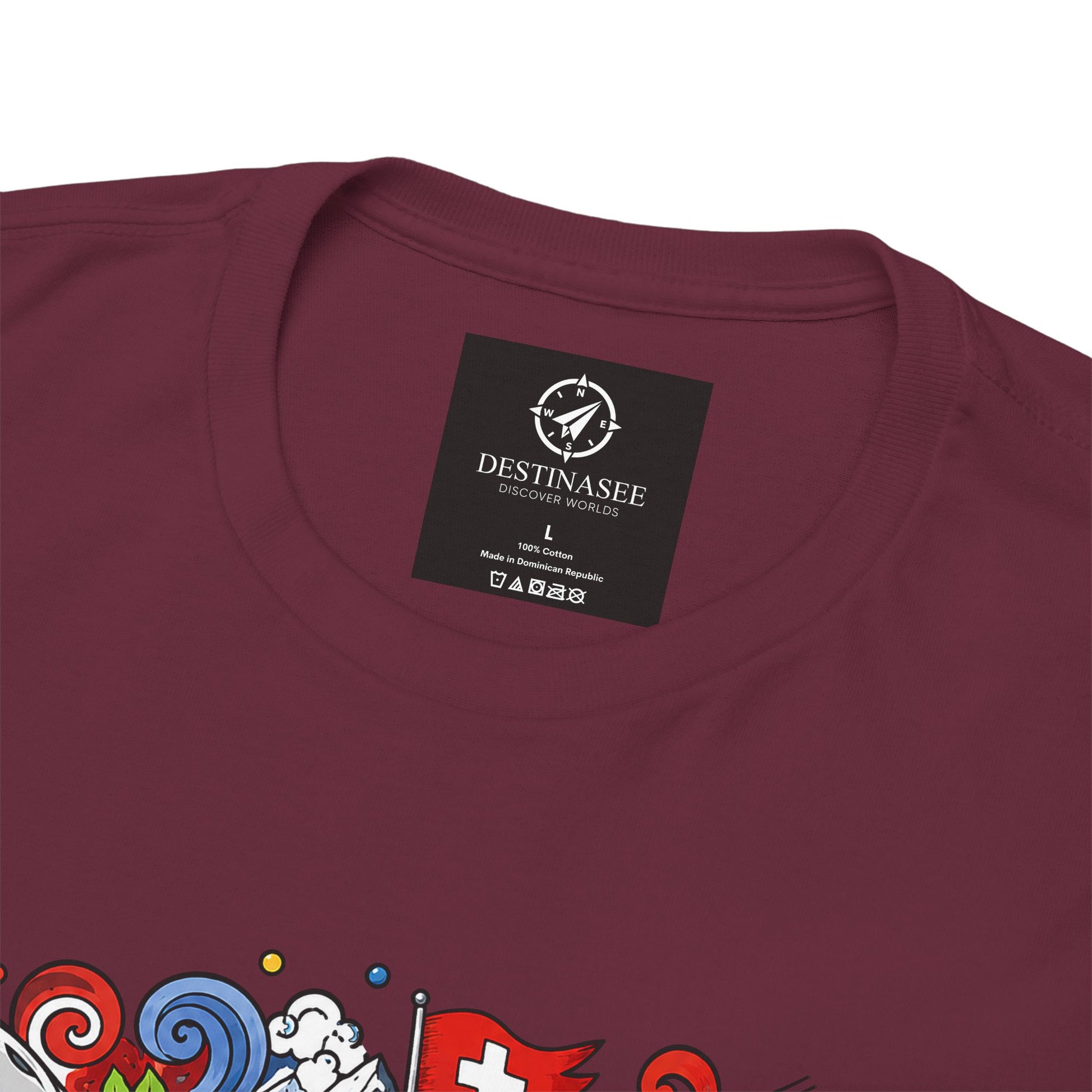 Maroon T-shirt close-up: Destinasee neck label and partial Switzerland artwork