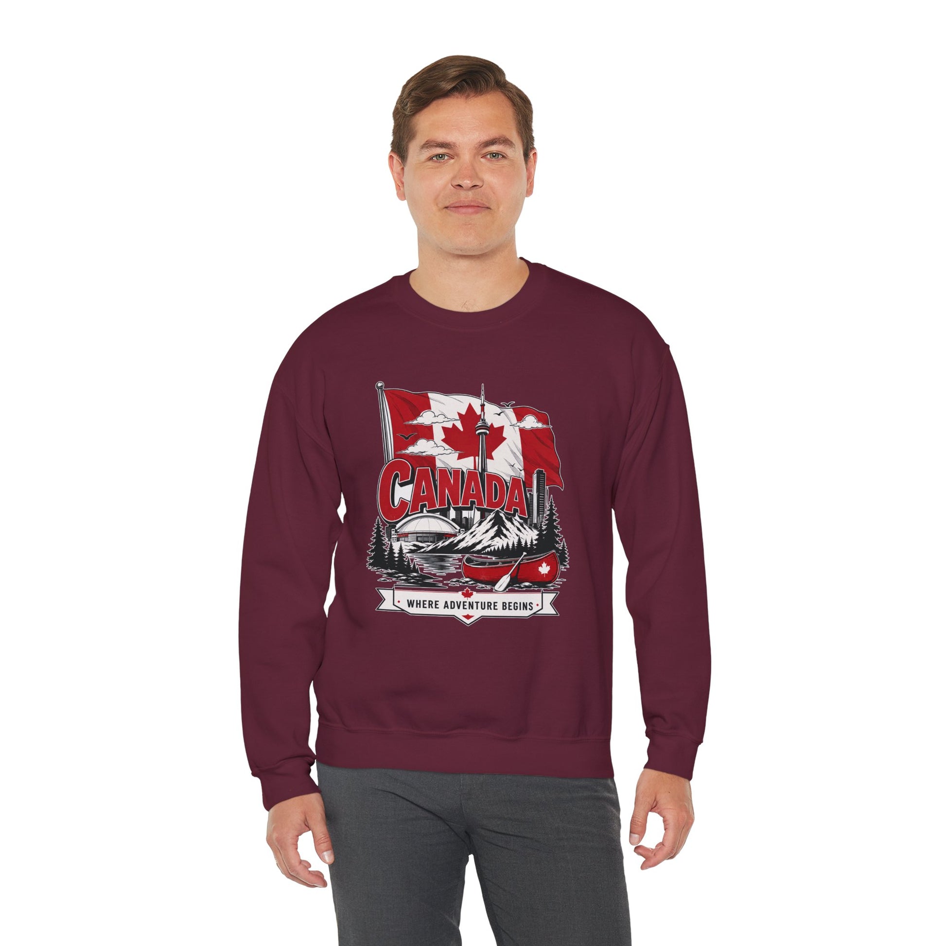 Maroon crewneck sweatshirt featuring Canada flag and canoe graphic on the chest.