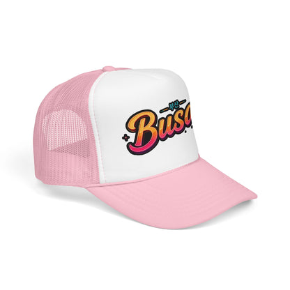Pink and white trucker hat with 'Busan' logo on white front panel