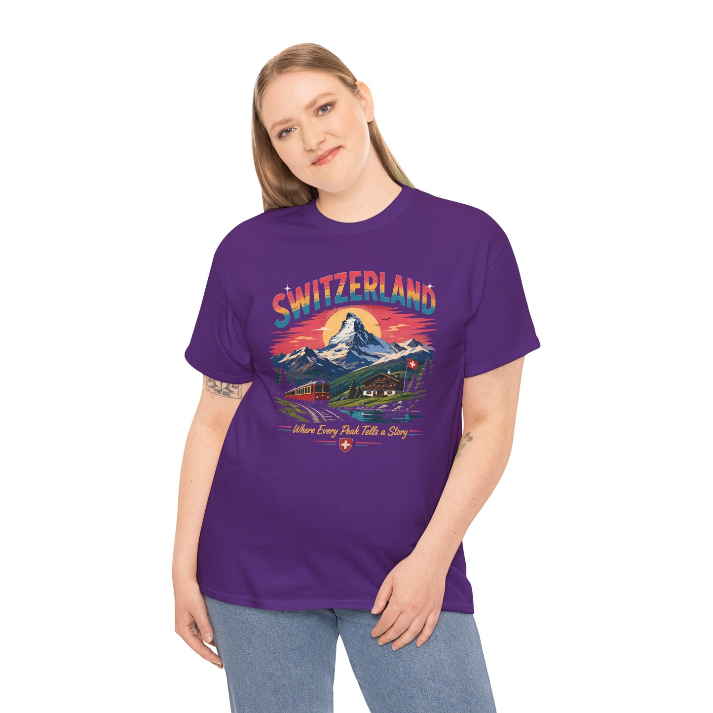 Purple crew-neck vintage T-shirt with Switzerland mountain scene graphic on model