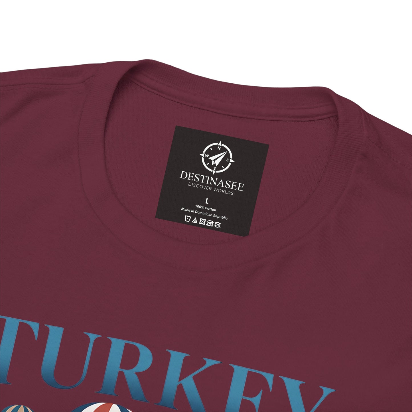 Burgundy T-shirt with Destinasee label and partial blue Turkey graphic