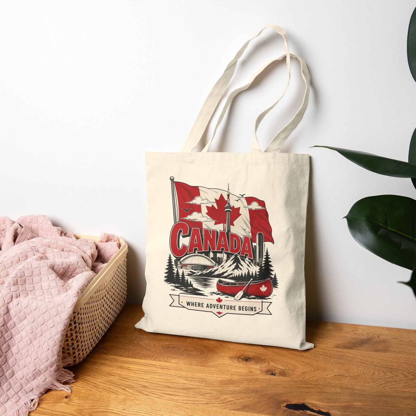 Natural canvas tote bag with Canada flag canoe graphic