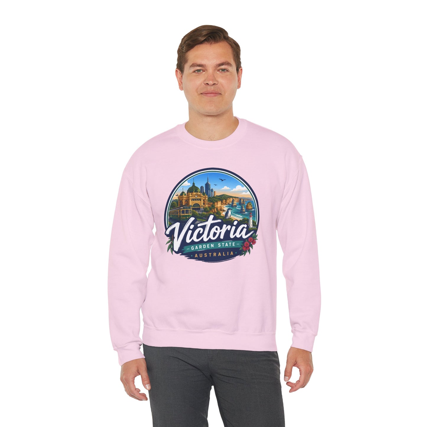 Light pink crewneck sweatshirt with circular Victoria Australia graphic on the chest