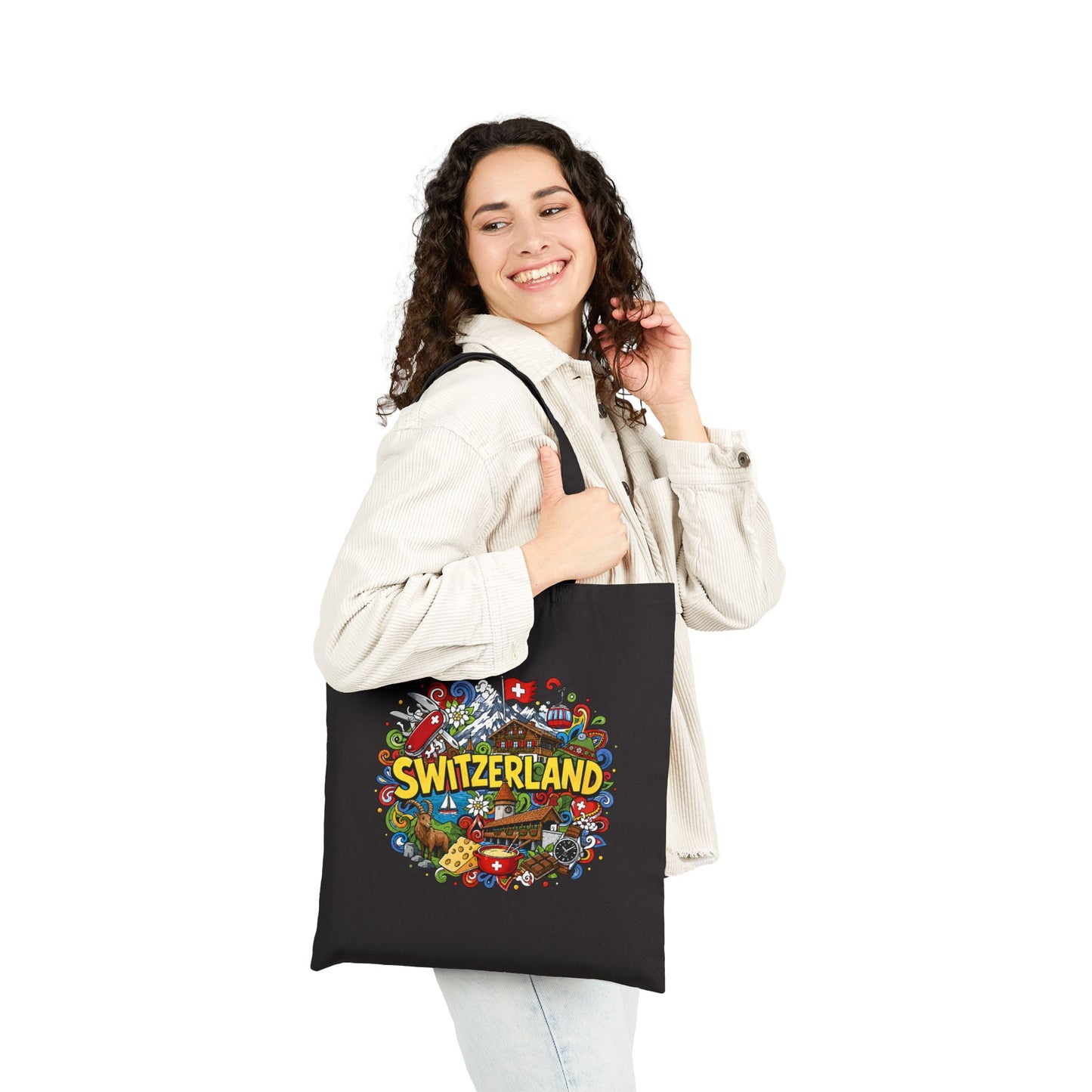 Black canvas tote bag with colorful Switzerland graphic and top handles