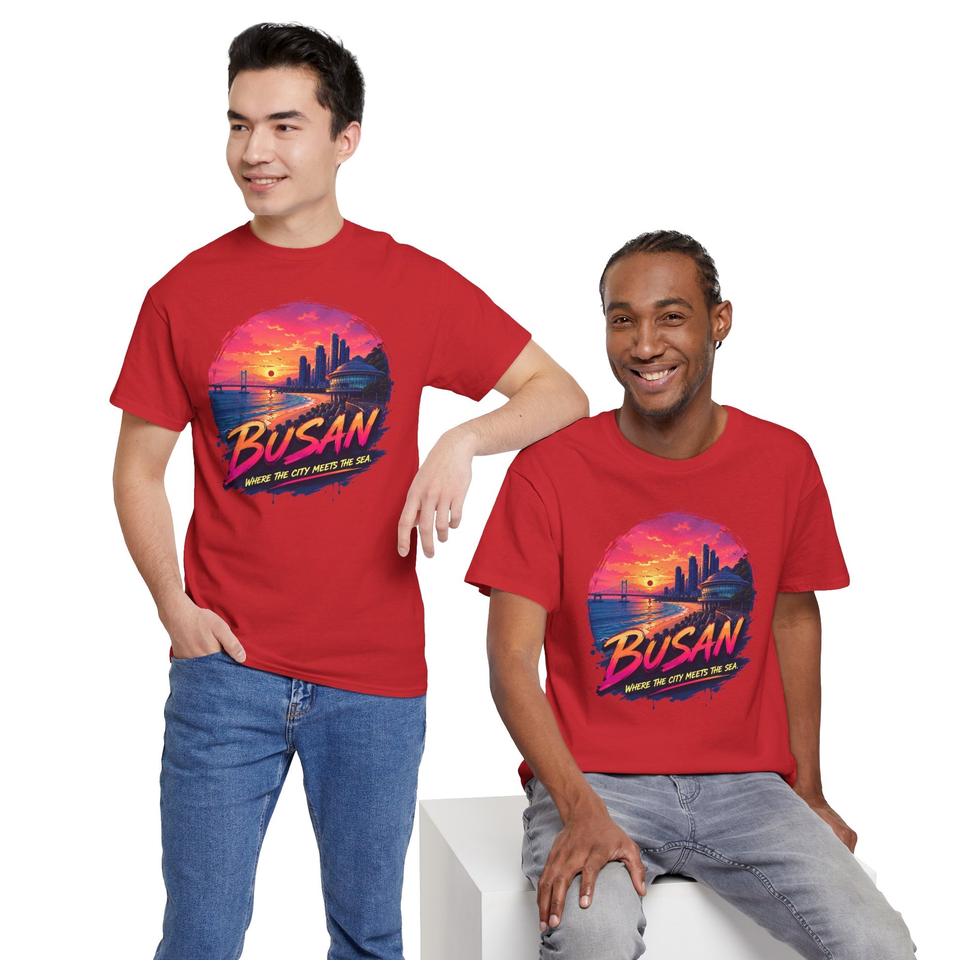 Red crew-neck T-shirt with Busan sunset graphic, styled with blue jeans.