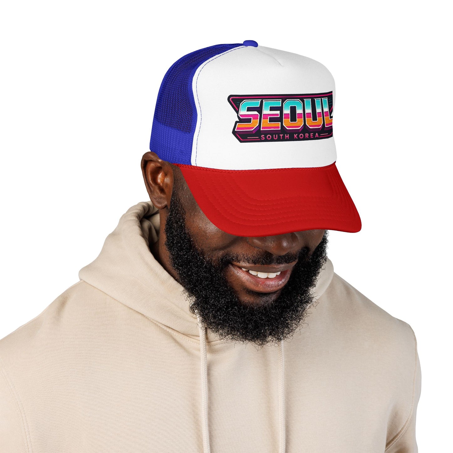 Blue and red trucker hat worn by man, front Seoul logo graphic