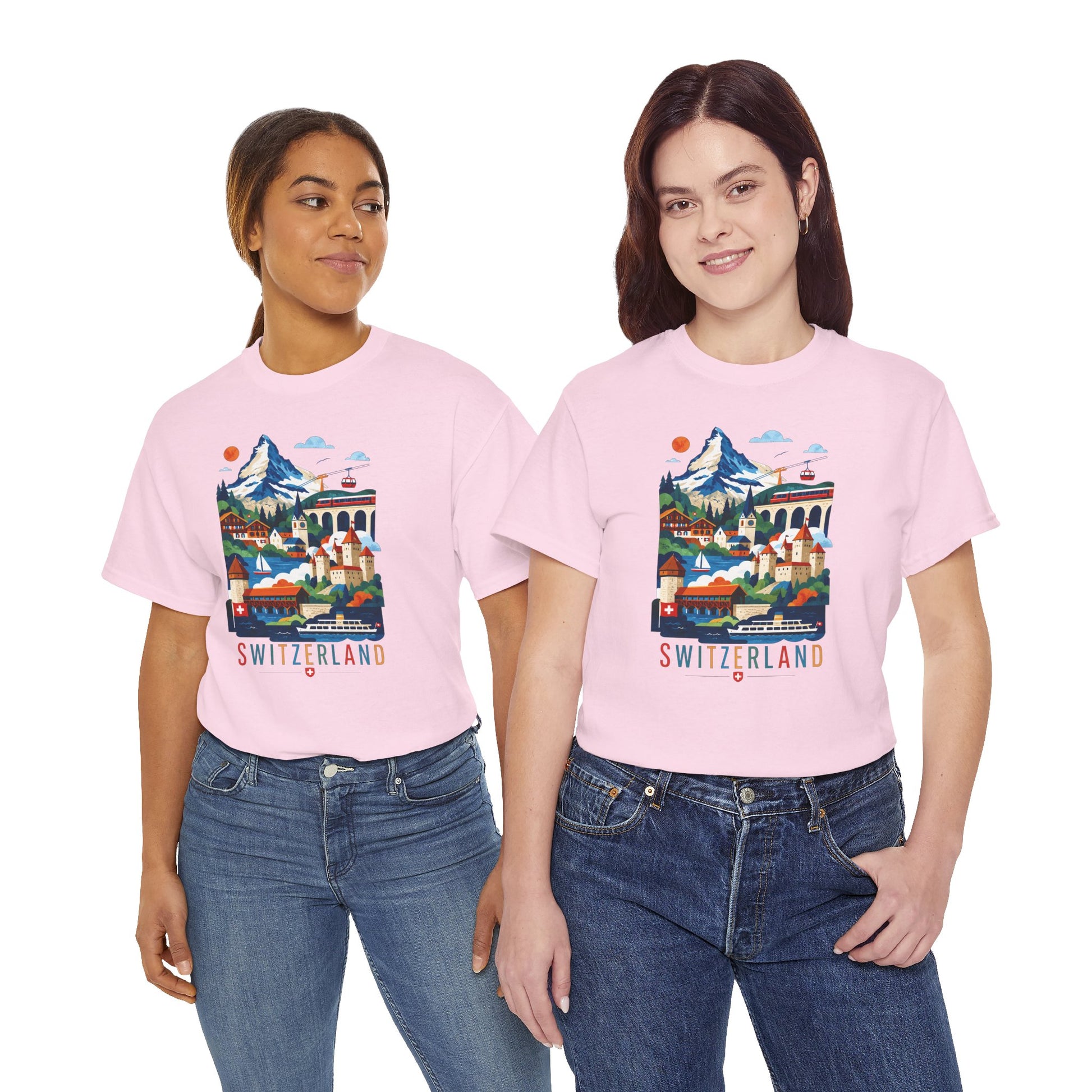 Light pink T-shirt with colorful Switzerland mountain village graphic and “SWITZERLAND”
