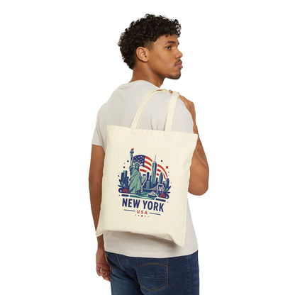 Natural cotton canvas tote bag worn on back, with Statue of Liberty New York graphic