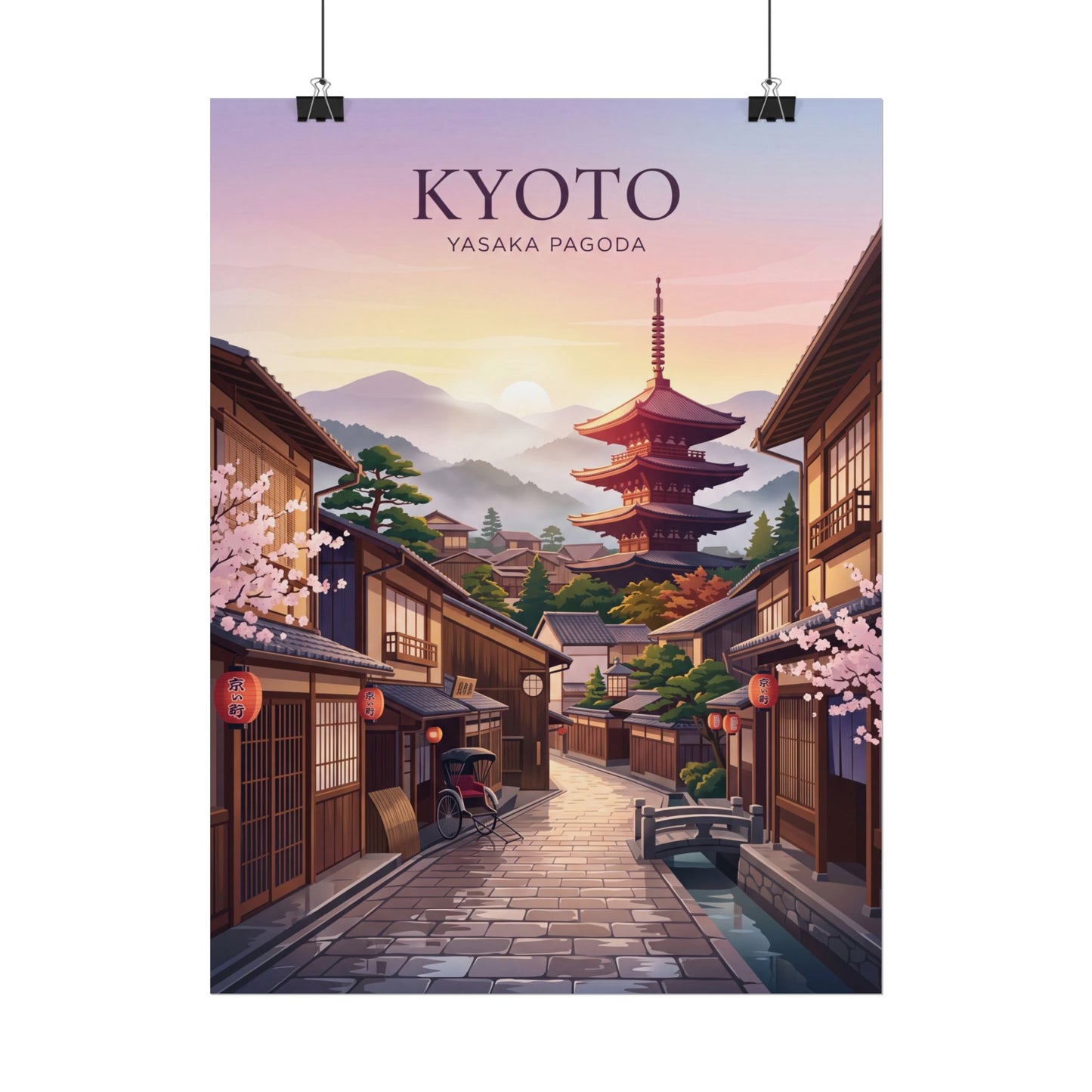 Rolled poster on clips: Kyoto street with Yasaka Pagoda tower, sunset sky and town buildings.