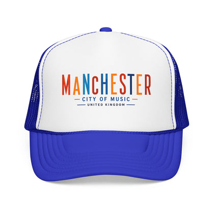 White and royal blue trucker hat with Manchester City of Music logo on front.